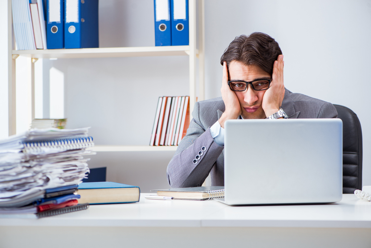 Businessman Workaholic Struggling with Pile of Paperwork